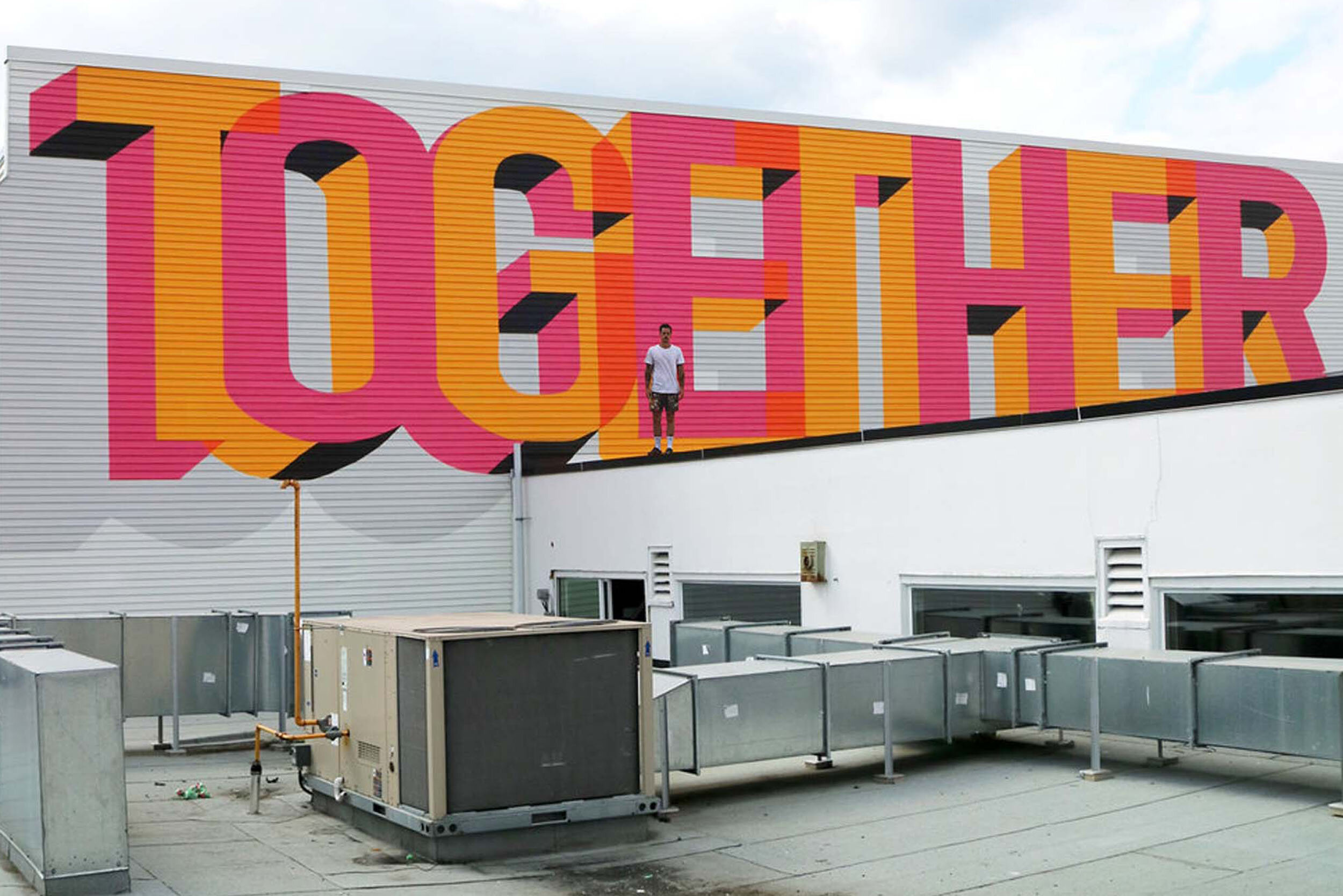 Local Artist Benjamin Johnston's mural titled Together in Strathcona for Vancouver Mural Festival.jpg