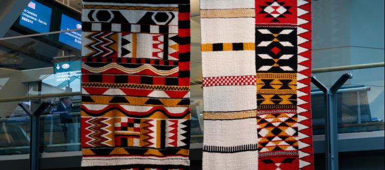 Debra’s weavings like these ones that hang in YVR were inspirations for the design of the pillars.